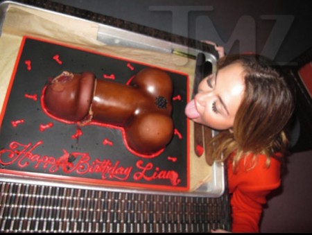 Miley Cyrus with cake