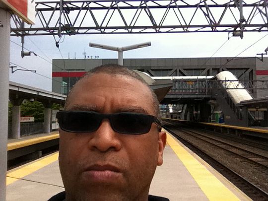 Reggie at Train station at Stamford